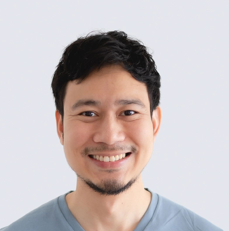 Professional headshot of Philip from Hearthstone Marketing, smiling and looking at the camera against a neutral background.